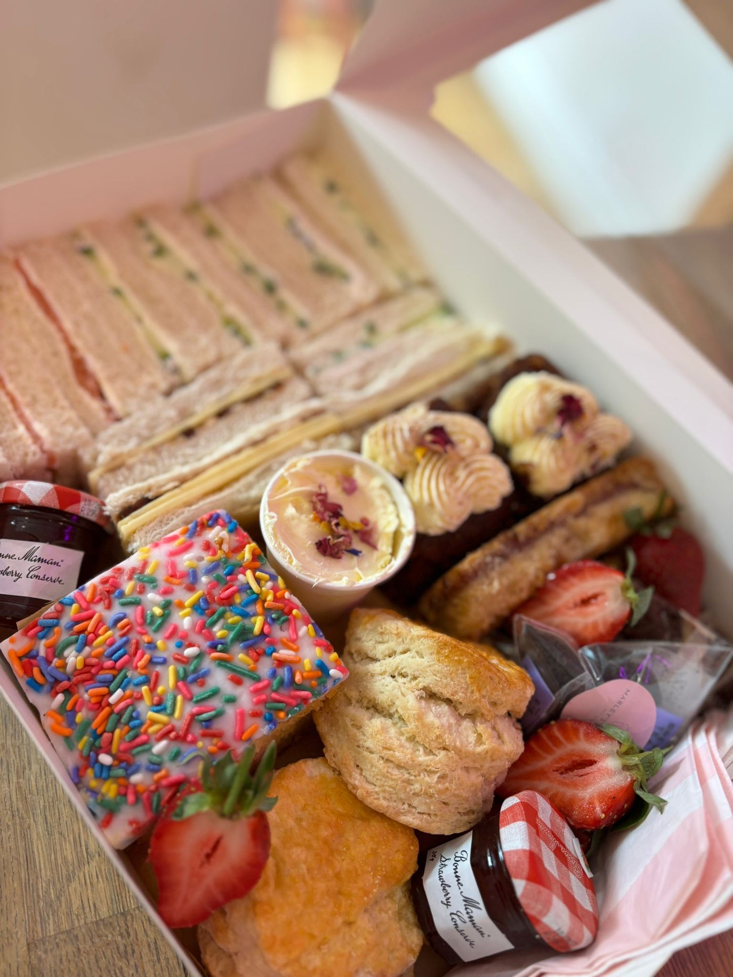 Afternoon tea box with sandwiches and cakes available for collection in Barnet EN5