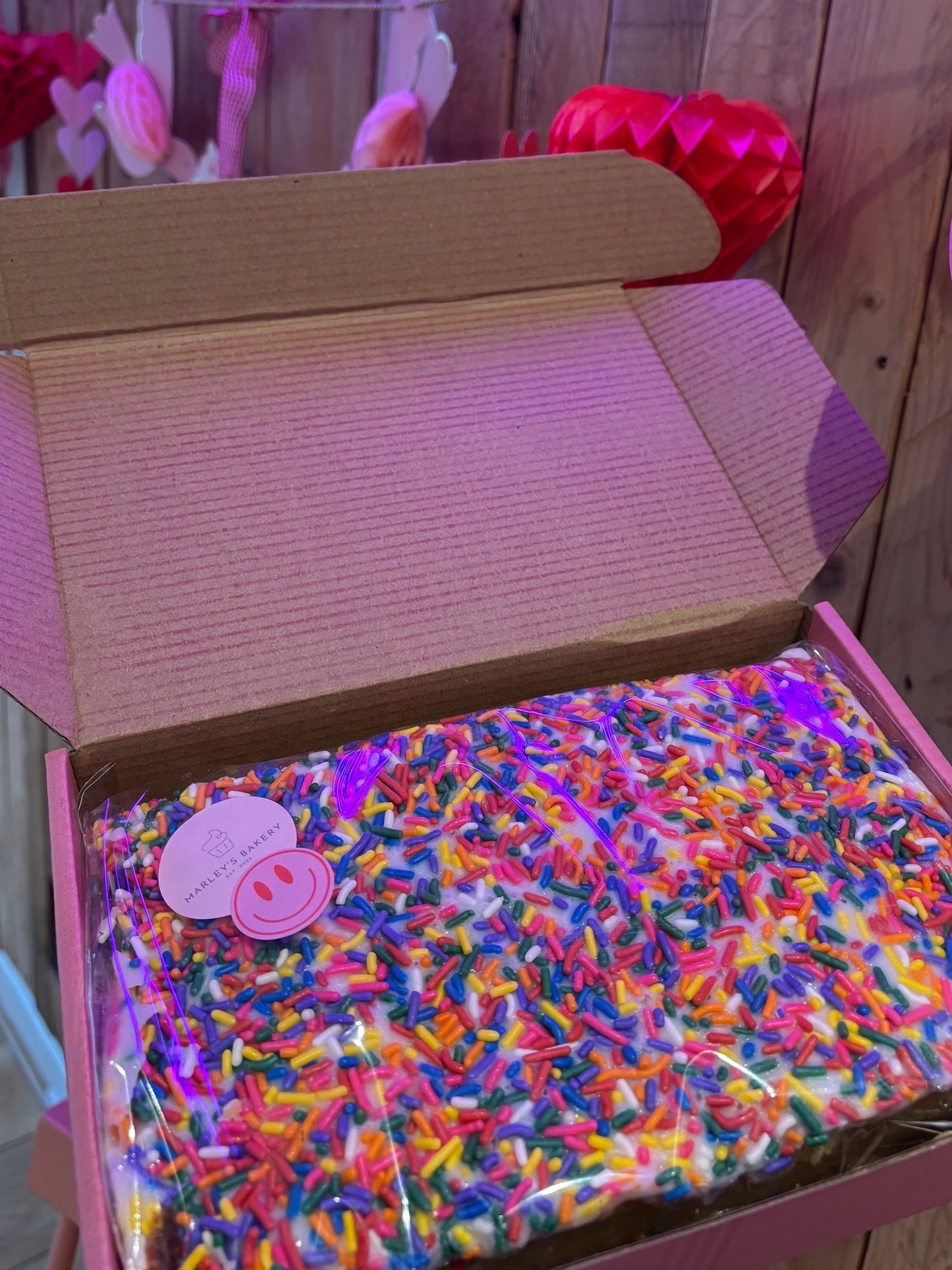 Old School Cake with thick icing and rainbow sprinkles, box of six slices