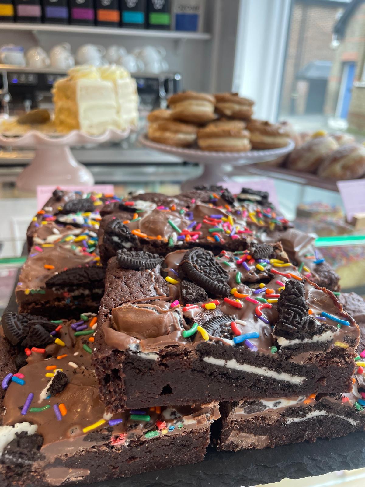 Oreo Funfetti brownies topped with chocolate and rainbow sprinkles at Marley’s Bakery