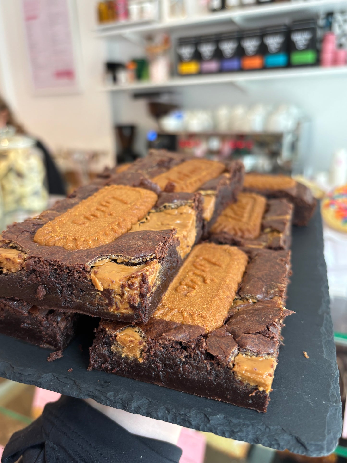Fudgy chocolate brownies topped with Lotus Biscoff biscuits