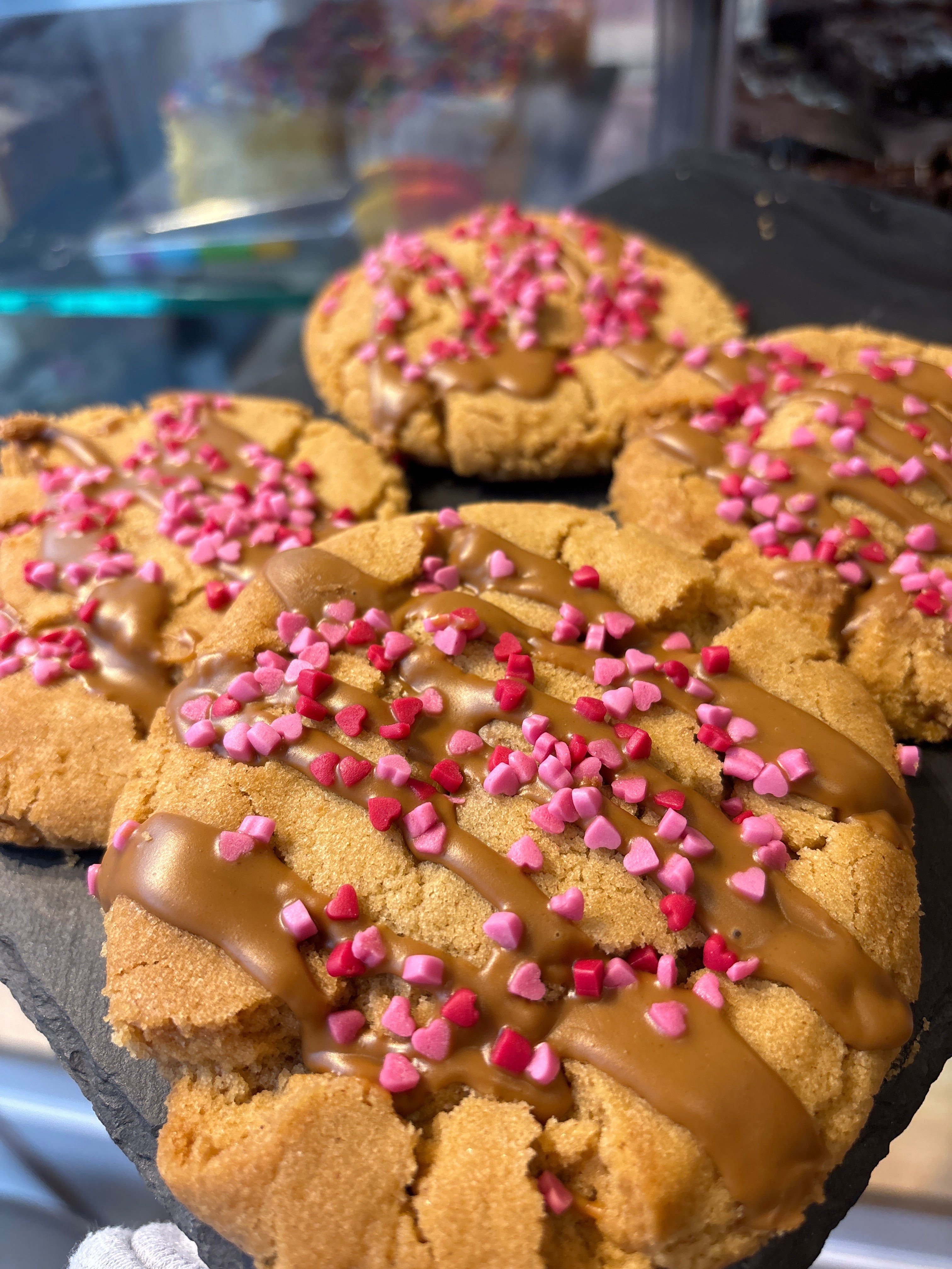 Freshly baked heart sprinkle cookies at Marley’s Bakery in Barnet EN5